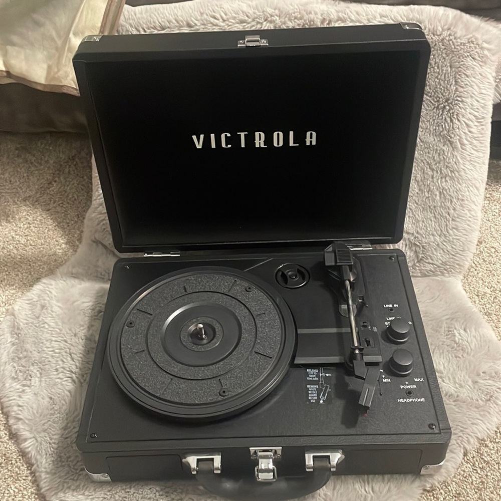 Victorla vinyl record player, vinyls and storage